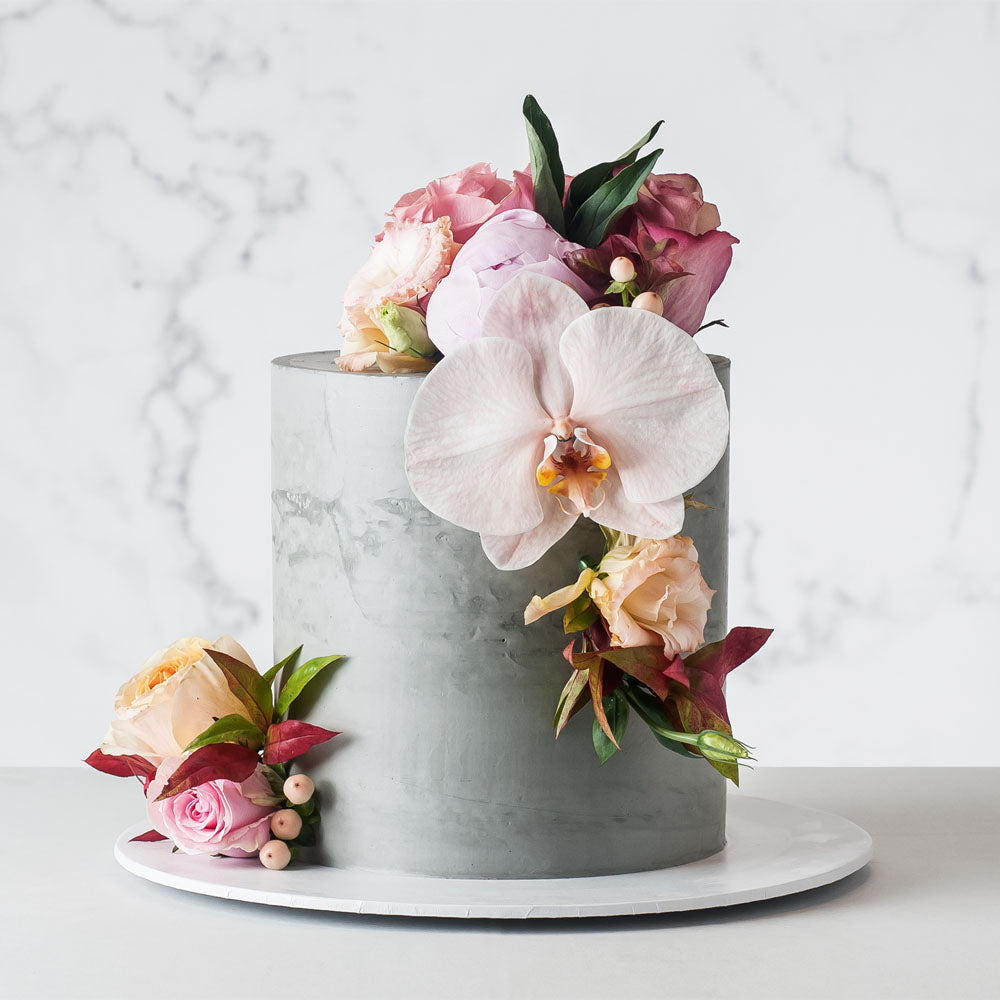 Concrete buttercream cake with flowers