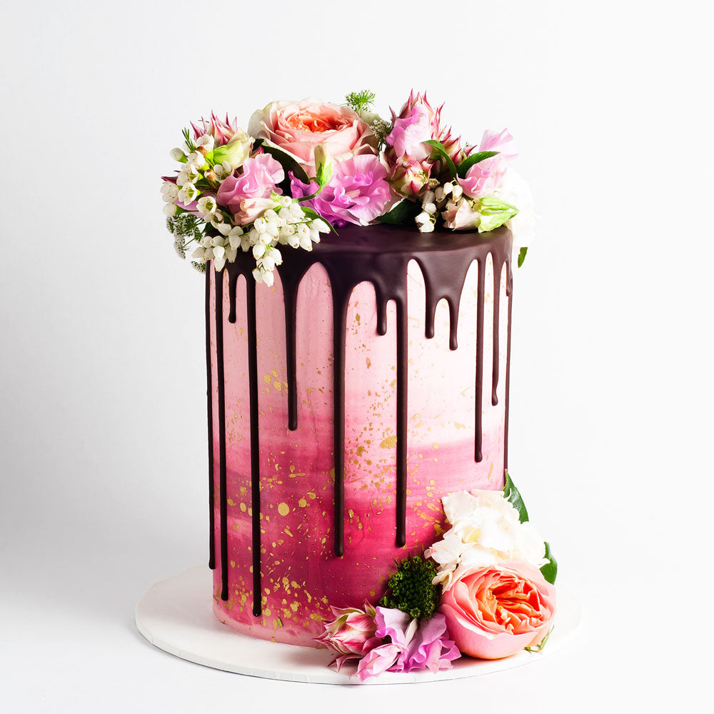 Pink watercolour buttercream cake with flowers